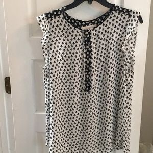 Black/white patterned flutter sleeveless top